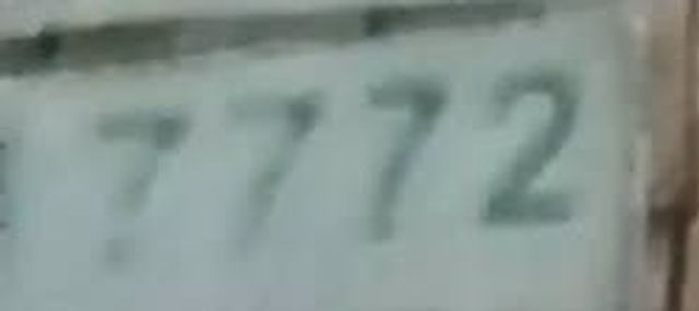 7772